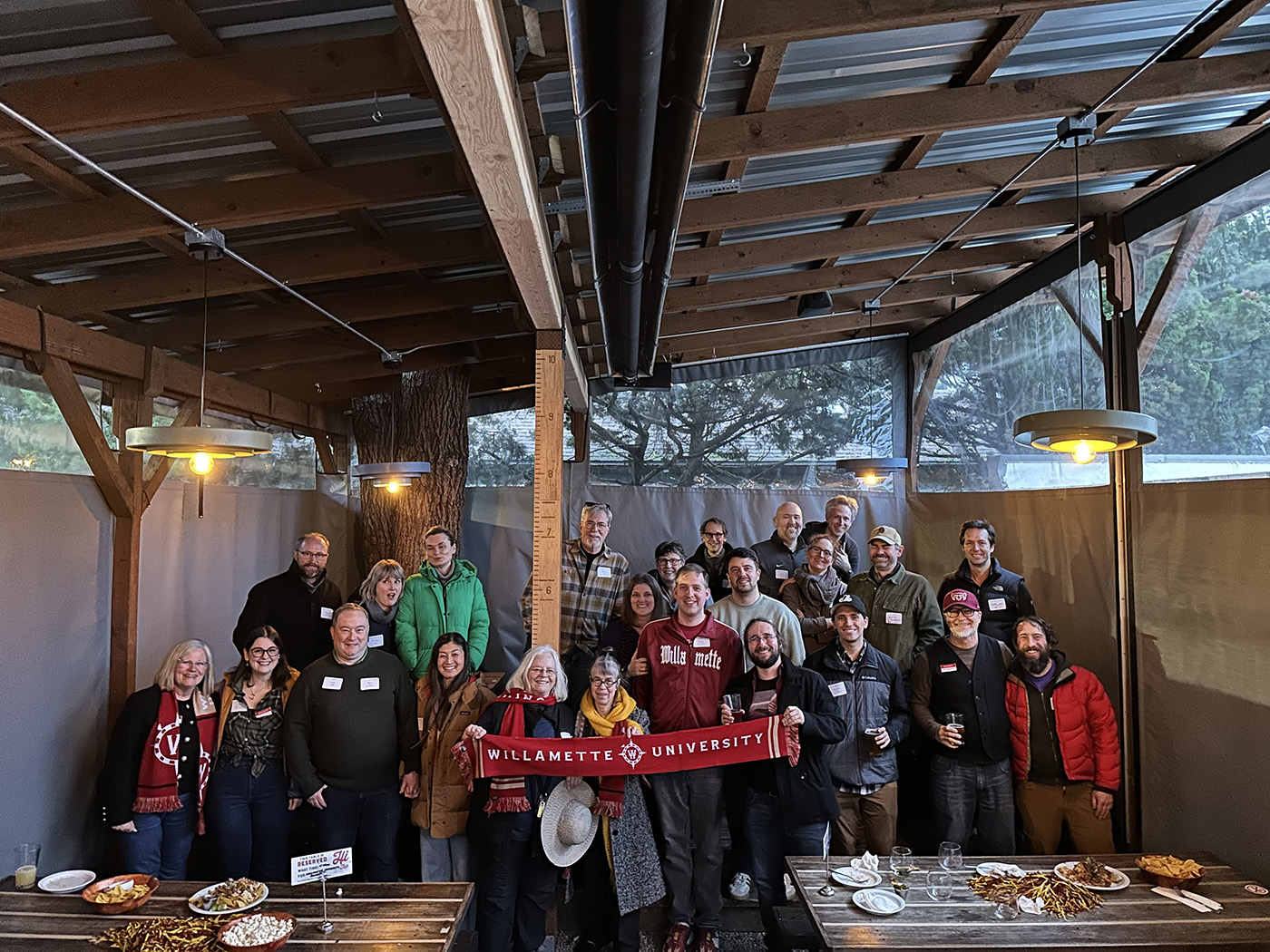 Alumni gathered for a happy hour at Hi-Top bar in Portland, OR.